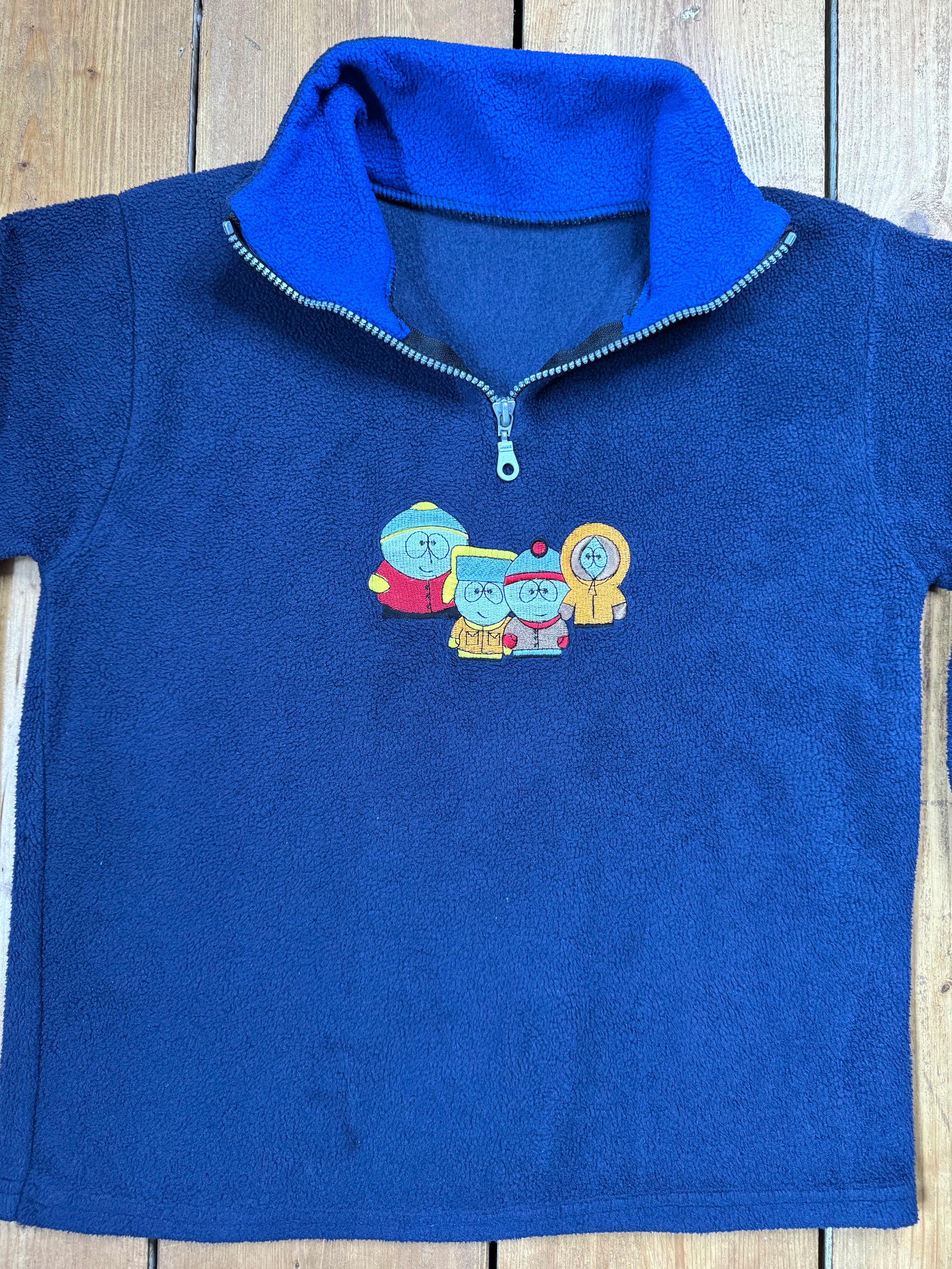 Vintage 90s 1/4 zip fleece with Southpark character chest emroidery. Age 9-10 years. Handpicked for Bee Tiny kids vintage. 