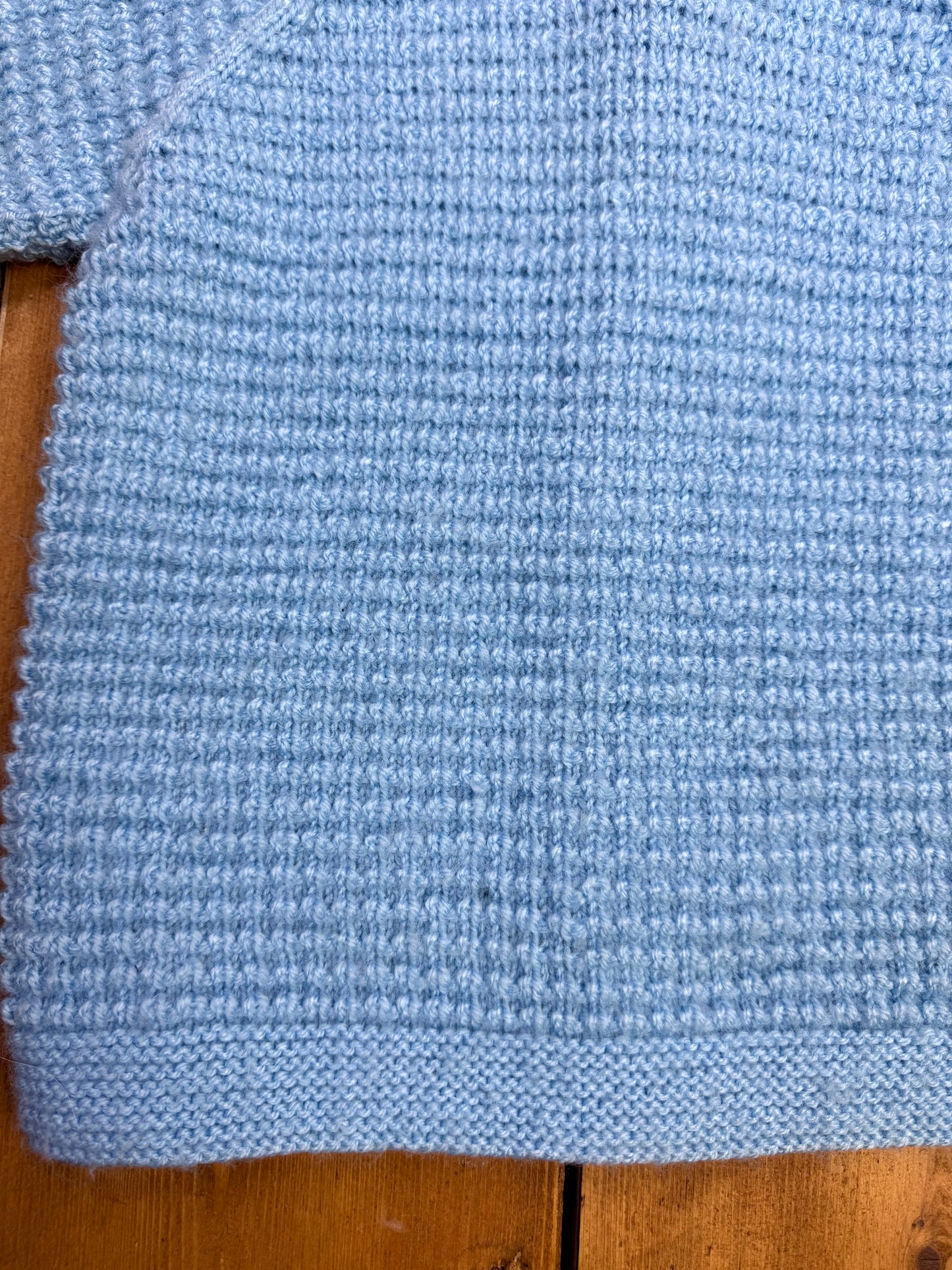 Blue knitted baby cardigan