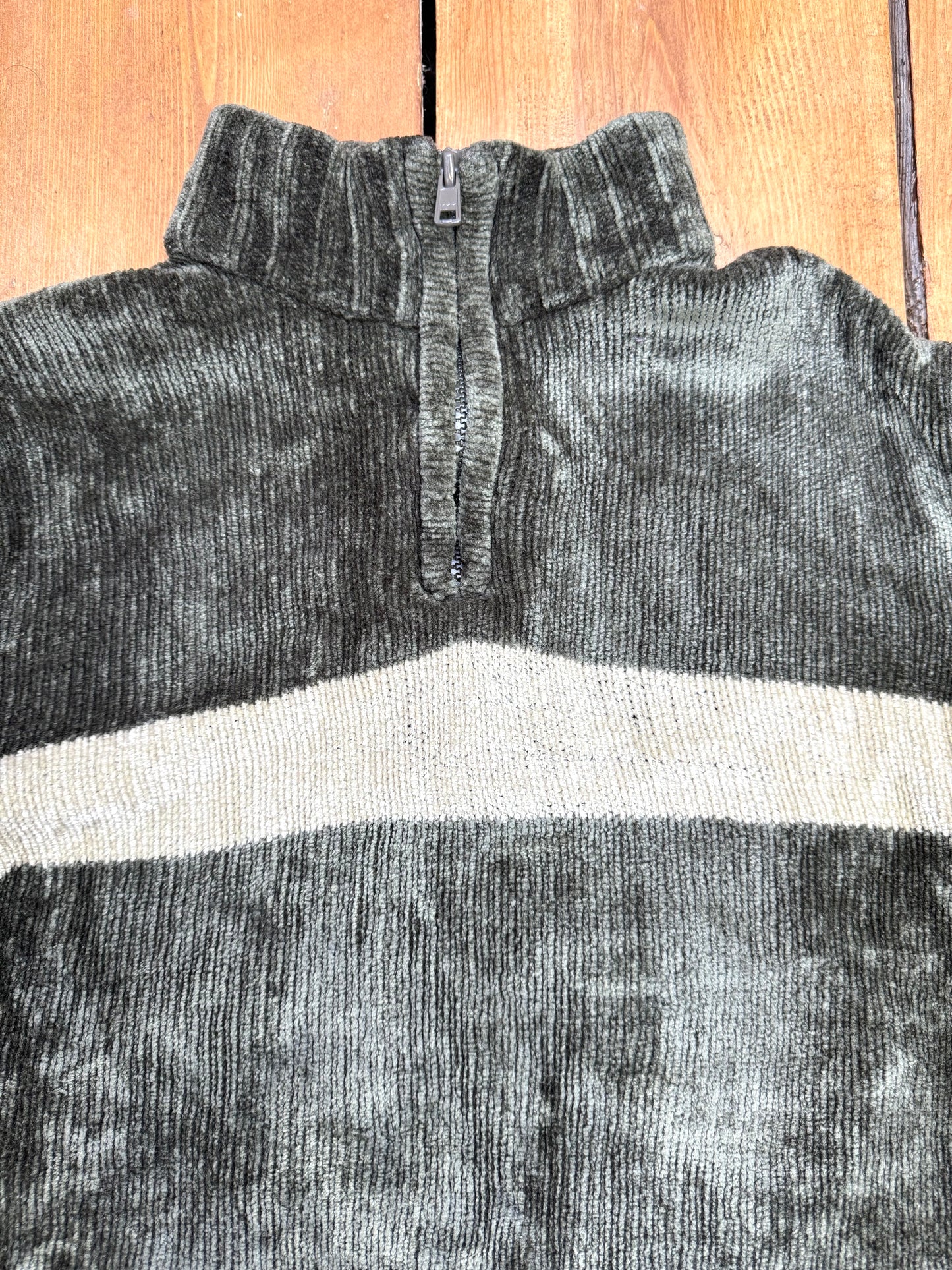 Green 1/4 zip jumper with a cream stripe