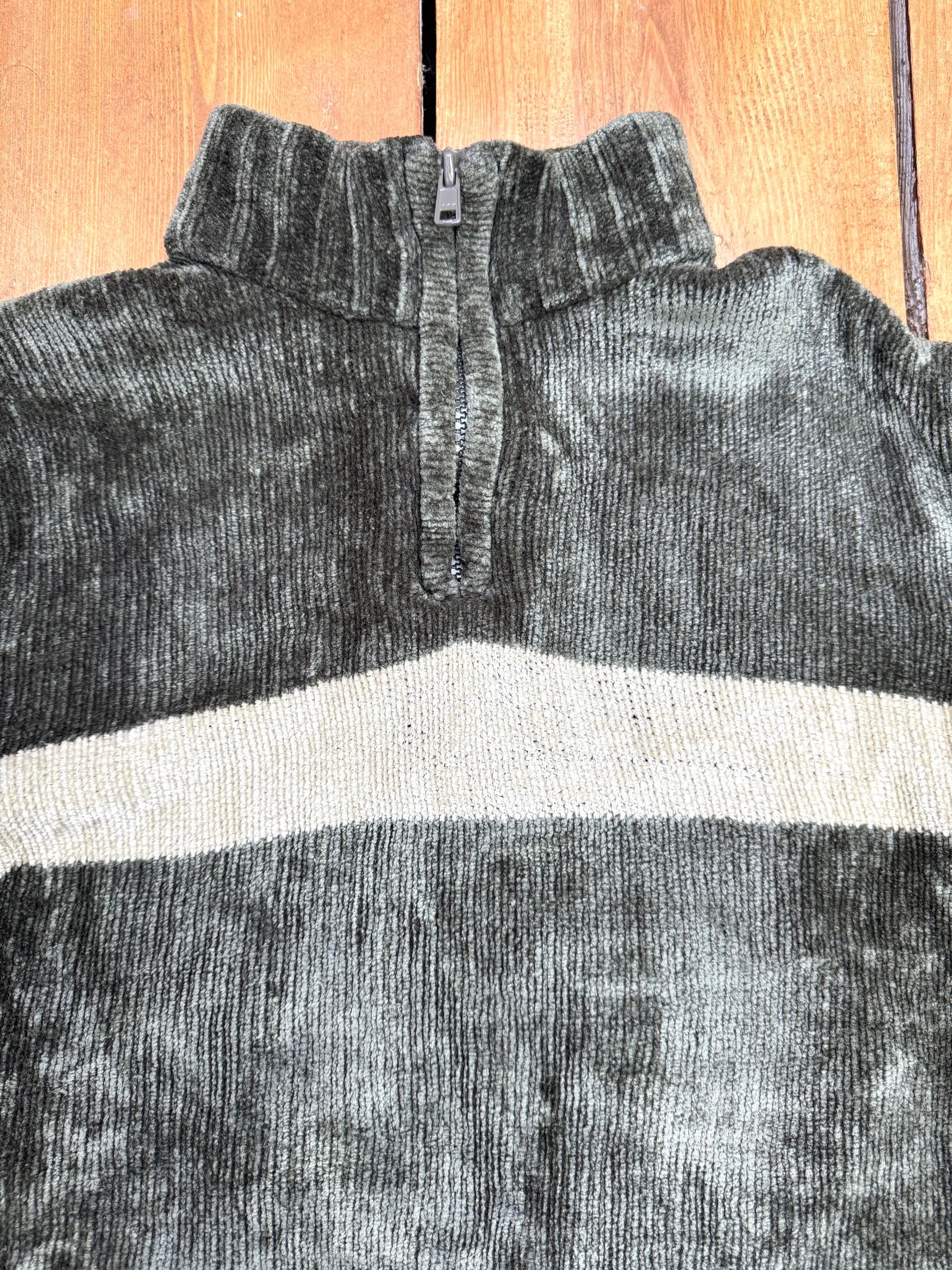 Green 1/4 zip jumper with a cream stripe